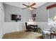 Home office with built-in desk and ceiling fan at 2611 Little Country Rd, Parrish, FL 34219