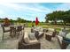 Relaxing patio with comfortable seating overlooking the golf course at 2611 Little Country Rd, Parrish, FL 34219