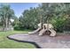 Community playground with slides and play structure at 2611 Little Country Rd, Parrish, FL 34219