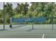 Community tennis court with net at 2611 Little Country Rd, Parrish, FL 34219