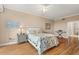 Bright bedroom with a comfortable bed and hardwood floors at 2925 Terra Ceia Bay Blvd # 2203, Palmetto, FL 34221
