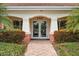 Attractive building exterior with landscaping and walkway at 2925 Terra Ceia Bay Blvd # 2203, Palmetto, FL 34221