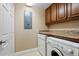 Laundry room includes washer, dryer, and ample counter space at 2925 Terra Ceia Bay Blvd # 2203, Palmetto, FL 34221