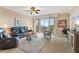 Relaxing living room with sliding doors to balcony and water view at 2925 Terra Ceia Bay Blvd # 2203, Palmetto, FL 34221