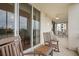 Spacious screened balcony with rocking chairs, perfect for relaxing at 2925 Terra Ceia Bay Blvd # 2203, Palmetto, FL 34221