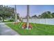 Landscaped front yard with tropical plants at 302 45Th W St, Bradenton, FL 34209