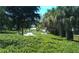 Landscaped grounds with benches and walkways at 3704 6Th Ave # 5, Holmes Beach, FL 34217