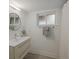 Clean bathroom with floating vanity and shower at 3751 S School Ave # 11, Sarasota, FL 34239