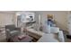 Open concept living space with sectional sofa and kitchen views at 3751 S School Ave # 11, Sarasota, FL 34239