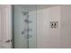 Clean shower with multiple shelves at 3751 S School Ave # 11, Sarasota, FL 34239