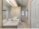 Bathroom with single vanity and shower/tub combo at 3915 Fonsica Ave, North Port, FL 34286