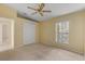 Bedroom with ceiling fan and closet at 3915 Fonsica Ave, North Port, FL 34286