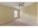 Bedroom with ceiling fan and closet at 3915 Fonsica Ave, North Port, FL 34286