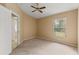 Bright bedroom with ceiling fan and closet at 3915 Fonsica Ave, North Port, FL 34286