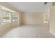 Spacious living room featuring tile flooring and large windows at 3915 Fonsica Ave, North Port, FL 34286