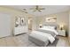 Spacious main bedroom with a dresser and ensuite bathroom at 3915 Fonsica Ave, North Port, FL 34286