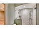 Bathroom with a large walk-in shower with marble tile at 3920 Red Rock Way, Sarasota, FL 34231