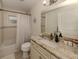 Well-appointed bathroom with granite vanity and bathtub at 4352 Adelaide Ave, North Port, FL 34288