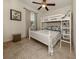 Charming bedroom with a bunk bed and plenty of storage at 4352 Adelaide Ave, North Port, FL 34288