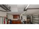 Organized garage with overhead storage and workbench at 4352 Adelaide Ave, North Port, FL 34288