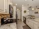 Modern kitchen with granite countertops and stainless steel appliances at 4352 Adelaide Ave, North Port, FL 34288