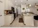 Modern kitchen with granite countertops and stainless steel appliances at 4352 Adelaide Ave, North Port, FL 34288