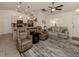 Spacious living room with comfortable seating and large area rug at 4352 Adelaide Ave, North Port, FL 34288