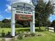 Sign for Butler Park, including address and community center details at 4352 Adelaide Ave, North Port, FL 34288