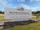 North Port Warm Mineral Springs Park entrance sign at 4352 Adelaide Ave, North Port, FL 34288
