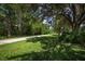 Paved park trail under a canopy of trees at 4352 Adelaide Ave, North Port, FL 34288