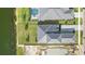 House with backyard and pool, next to a lake at 4517 Mondrian Ct, Sarasota, FL 34240