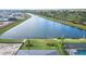 Backyard view of home next to a lake at 4517 Mondrian Ct, Sarasota, FL 34240