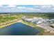 Community view showcasing lake and homes at 4517 Mondrian Ct, Sarasota, FL 34240