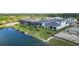 Lakefront home with pool and lush landscaping at 4517 Mondrian Ct, Sarasota, FL 34240