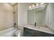 Clean bathroom with a bathtub and single vanity at 4517 Mondrian Ct, Sarasota, FL 34240