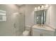 Modern bathroom with a glass shower and white cabinetry at 4517 Mondrian Ct, Sarasota, FL 34240
