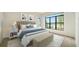 Bedroom with large window and water view at 4517 Mondrian Ct, Sarasota, FL 34240