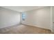 Bright bedroom with carpet flooring and large window at 4517 Mondrian Ct, Sarasota, FL 34240