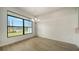 Dining room features large windows and water views at 4517 Mondrian Ct, Sarasota, FL 34240