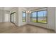 Dining room features large windows and water views at 4517 Mondrian Ct, Sarasota, FL 34240
