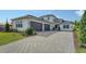 Two-story house with paver driveway at 4517 Mondrian Ct, Sarasota, FL 34240