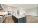 Modern kitchen features stainless steel appliances and a large island at 4517 Mondrian Ct, Sarasota, FL 34240