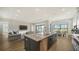 Modern kitchen with large island and stainless steel appliances at 4517 Mondrian Ct, Sarasota, FL 34240