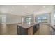 Modern kitchen with island, stainless steel appliances, and water view at 4517 Mondrian Ct, Sarasota, FL 34240
