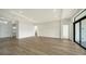 Open living area with wood-look floors at 4517 Mondrian Ct, Sarasota, FL 34240