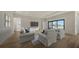 Open living area with sliding glass doors at 4517 Mondrian Ct, Sarasota, FL 34240