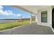 Covered patio overlooking a lake at 4517 Mondrian Ct, Sarasota, FL 34240