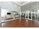 Yoga studio with hardwood floors and large mirrors at 4517 Mondrian Ct, Sarasota, FL 34240