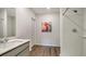 Clean bathroom with a walk-in shower and updated vanity at 4519 Boxelder Avenue, Parrish, FL 34219