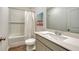 Clean bathroom with tub, toilet, and vanity with quartz top at 4519 Boxelder Avenue, Parrish, FL 34219